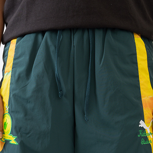 KIDSUPER X マメロディ・サンダウンズFC トラベルパンツ